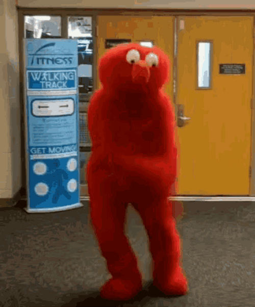 Elmo Happily Dancing GIF