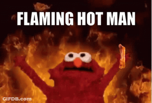 Elmo Holding Bacon In Front Of Flames Flaming Hot Man GIF