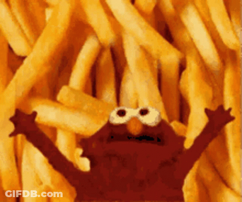 Elmo In Front Of French Fries GIF