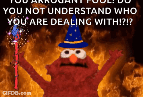 Elmo In Wizard Hat Holding Wand GIF