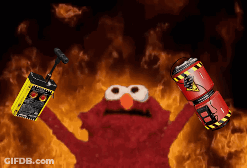 Elmo Is Holding A Yellow Box That Says " Warning " On It GIF