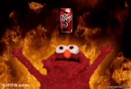 Elmo Is Holding Up His Arms In Front Of A Dr Pepper Can GIF