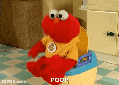 Elmo Is Sitting On A Potty With The Word Poop Written On It . GIF