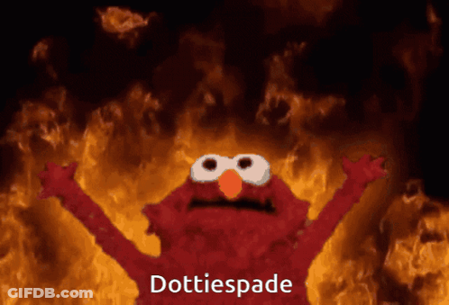 Elmo Is Standing In Front Of A Fire And Says ' Dottiespade ' At The Bottom GIF