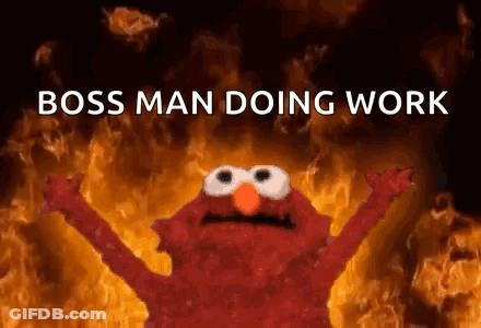 Elmo Is Standing In Front Of A Fire With The Words `` Boss Man Doing Work '' Written Above Him . GIF