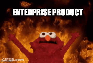 Elmo Is Standing In Front Of A Fire With The Words Enterprise Product Written Below Him GIF