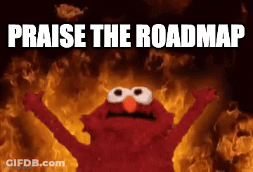 Elmo Is Standing In Front Of A Fire With The Words Praise The Roadmap Written Below Him GIF