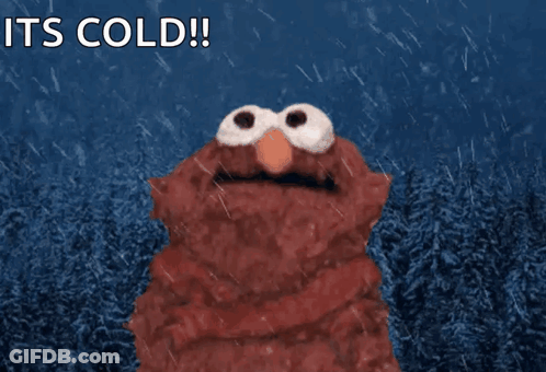Elmo Is Standing In The Rain With The Words It 'S Cold GIF