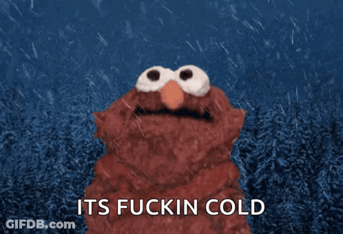 Elmo Is Standing In The Rain With The Words Its Fuckin Cold Above Him GIF