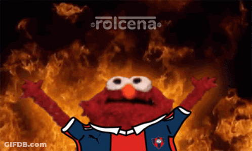 Elmo Is Wearing A Shirt With The Word Rolcena On It GIF