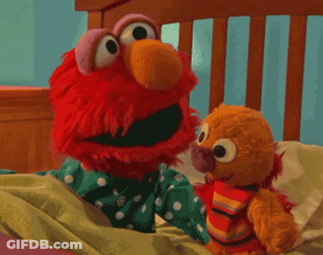 Elmo Kissing His Toy GIF