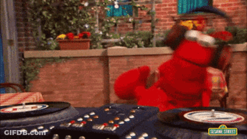 Elmo Playing Roulette On Record Player GIF