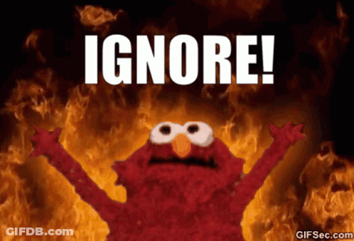 Elmo Saying Ignore In Front Of Fire GIF