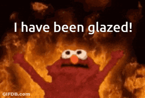 Elmo Says I Have Been Glazed In Front Of Fire GIF