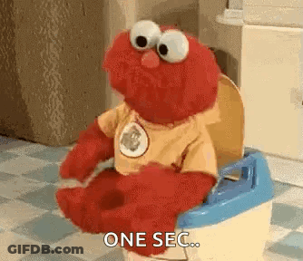 Elmo Sitting On Potty One Sec GIF