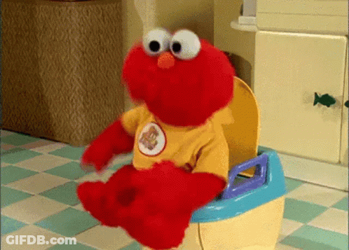 Elmo Sitting On Potty Wearing Yellow Bear Shirt GIF