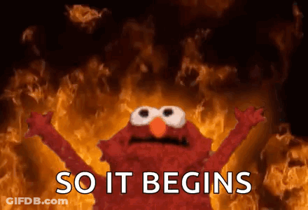 Elmo Standing Before Fire So It Begins GIF