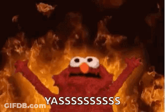 Elmo Standing In Front Of Fire With Arms Up GIF