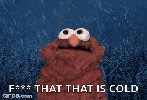 Elmo Standing In Rain Saying That That Is Cold GIF