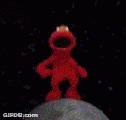 Elmo Standing On Moon Holding Planet GIF
