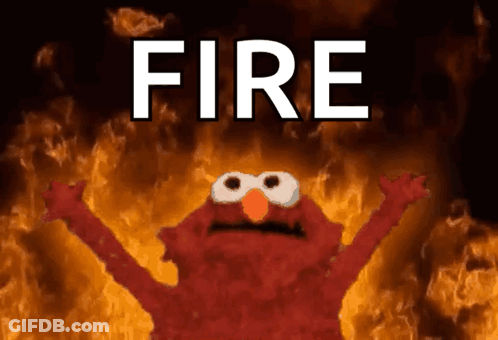 Elmo Surrounded By Flames Saying Fire GIF