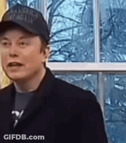 Elon Musk In Black Hat And Black Jacket GIF