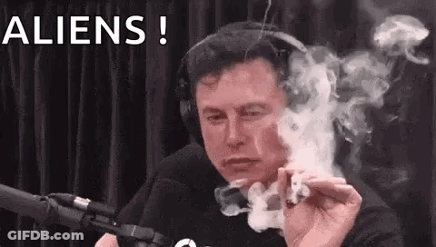 Elon Musk Is Smoking A Marijuana Joint In Front Of A Microphone While Wearing Headphones . GIF