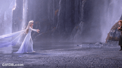 Elsa And Anna From Frozen Are Standing Next To Each Other GIF