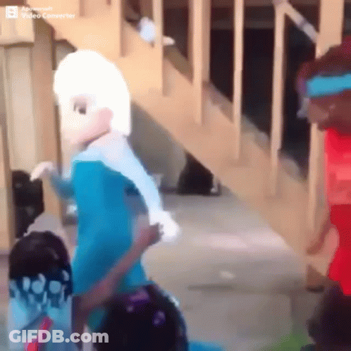 Elsa From Frozen Standing Next To Two Children GIF