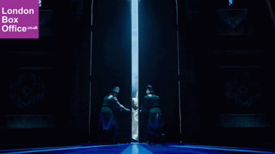 Elsa Rushes Inside Giant Doors Frozen GIF