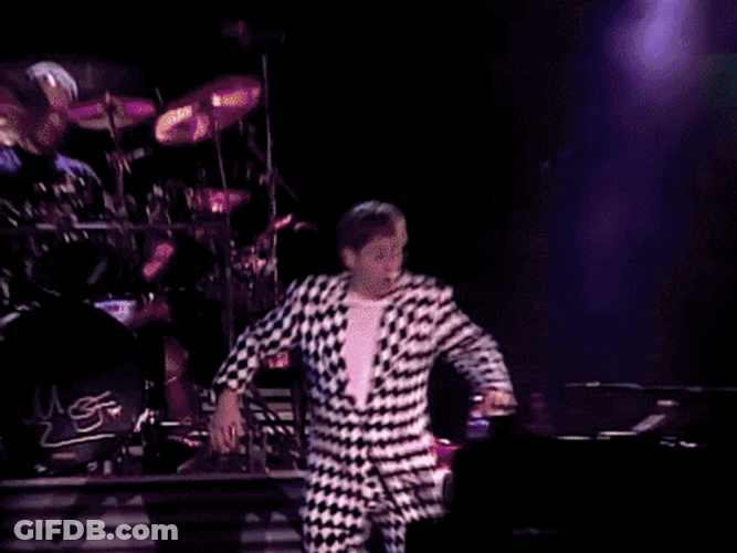 Elton John Lying Down On Piano GIF