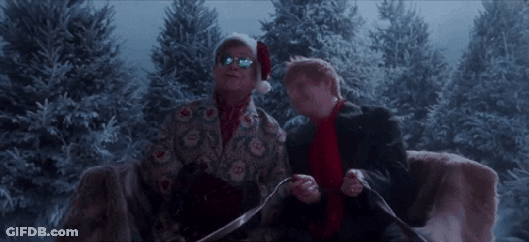 Elton John With Ed Sheeran On Sleigh GIF