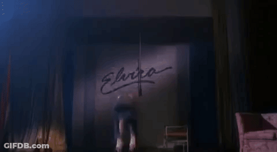 Elvira Doing A Backflip GIF