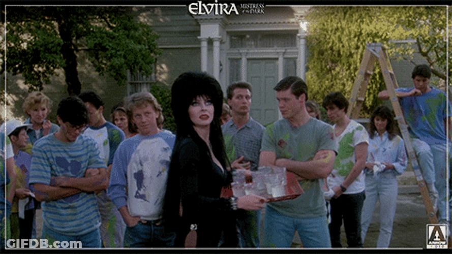 Elvira Dropping A Tray Of Glasses GIF