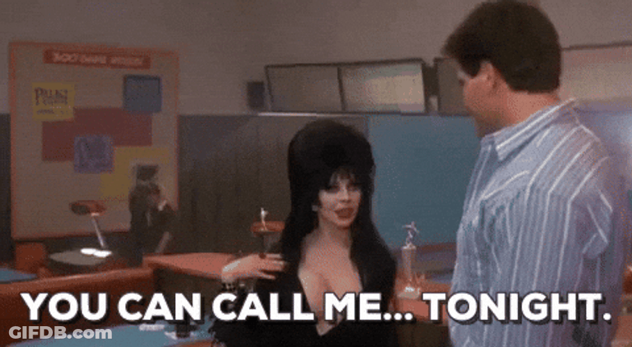 Elvira Talking To A Bob Redding GIF