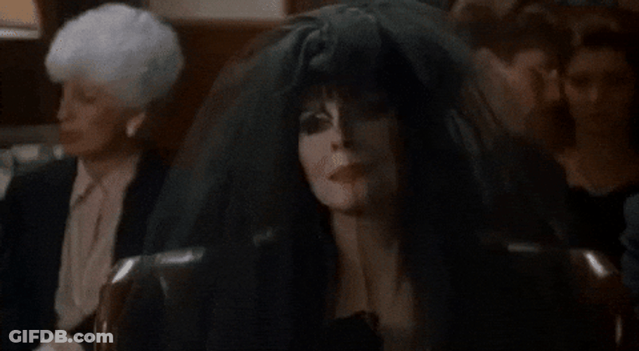 Elvira Wearing A Black Veil GIF