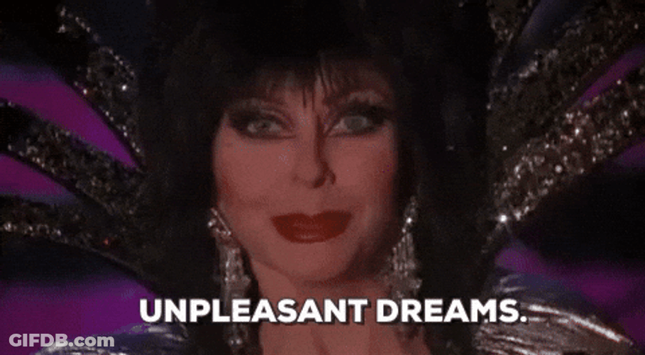 Elvira Winking Unpleasant Dreams GIF