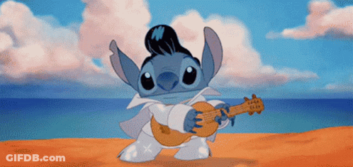 Elvis Cartoon Playing Guitar On Beach GIF