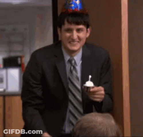 Elvis Presley Singing Into Microphone In White Suit GIF