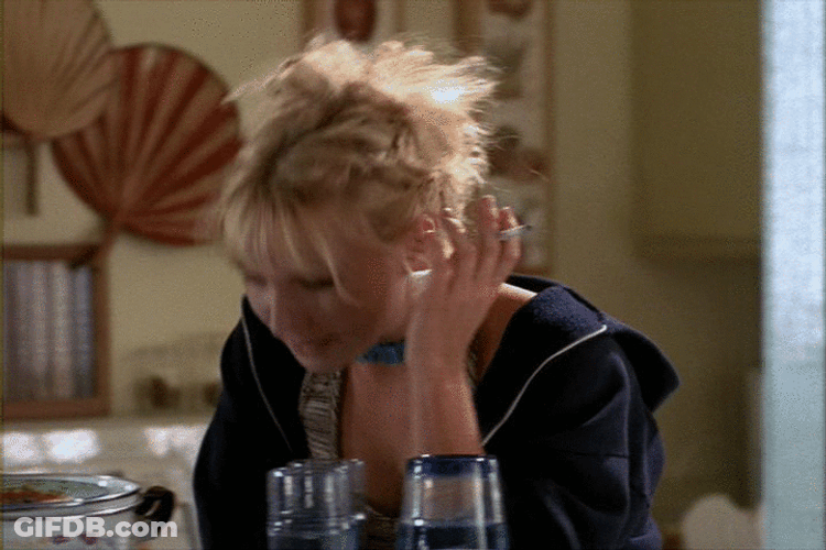 Embarrassed Blonde Girl Smoking GIF