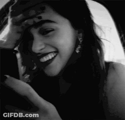 Emilia Clarke Actress Embarrassed Smile GIF