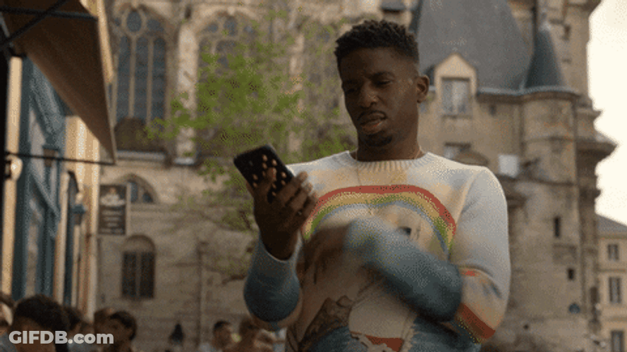 Emily In Paris Answering Phone Call GIF