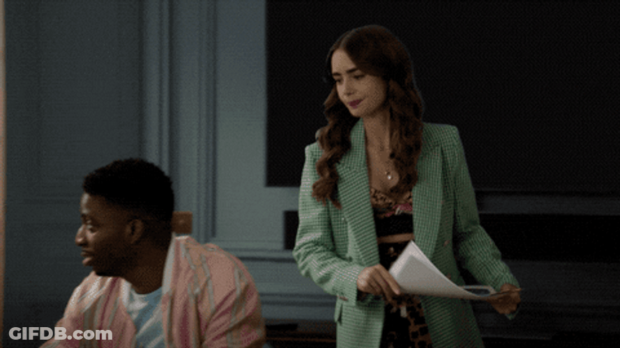 Emily In Paris Hit Someone's Face With Paper GIF