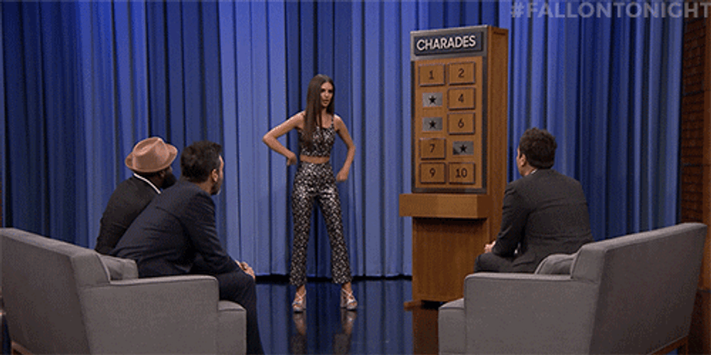 Emily Ratajkowski Flapping Her Arms GIF