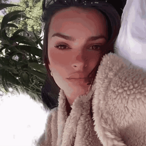 Emily Ratajkowski Lying GIF