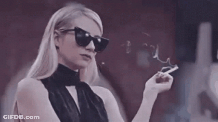 Emma Roberts Shrug Nothing GIF