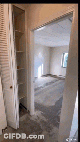 Empty Room With Closet And Door To Window GIF
