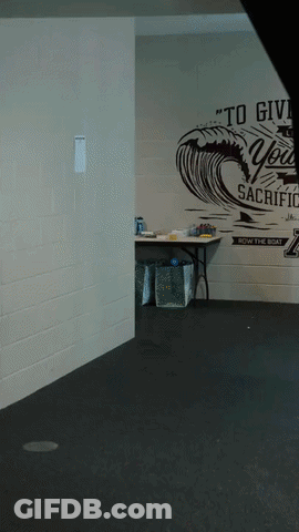Empty Room With Sign Saying To Give You Sacrifice GIF