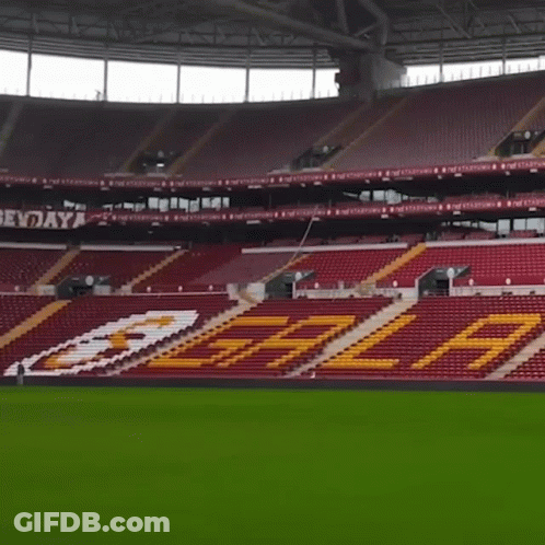 Empty Stadium With Red Seats And Yellow Letters Tasa GIF