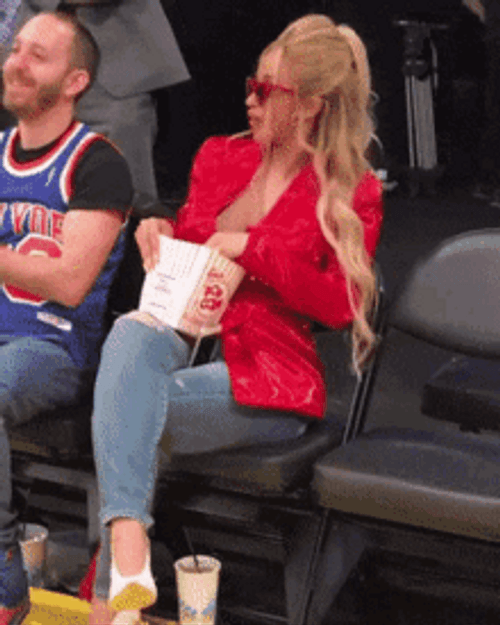 Enjoying Eating Popcorn GIF